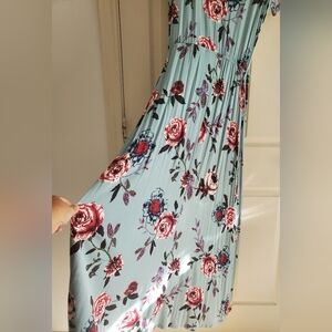 About a girl long wrap hi low floral dress. Size S